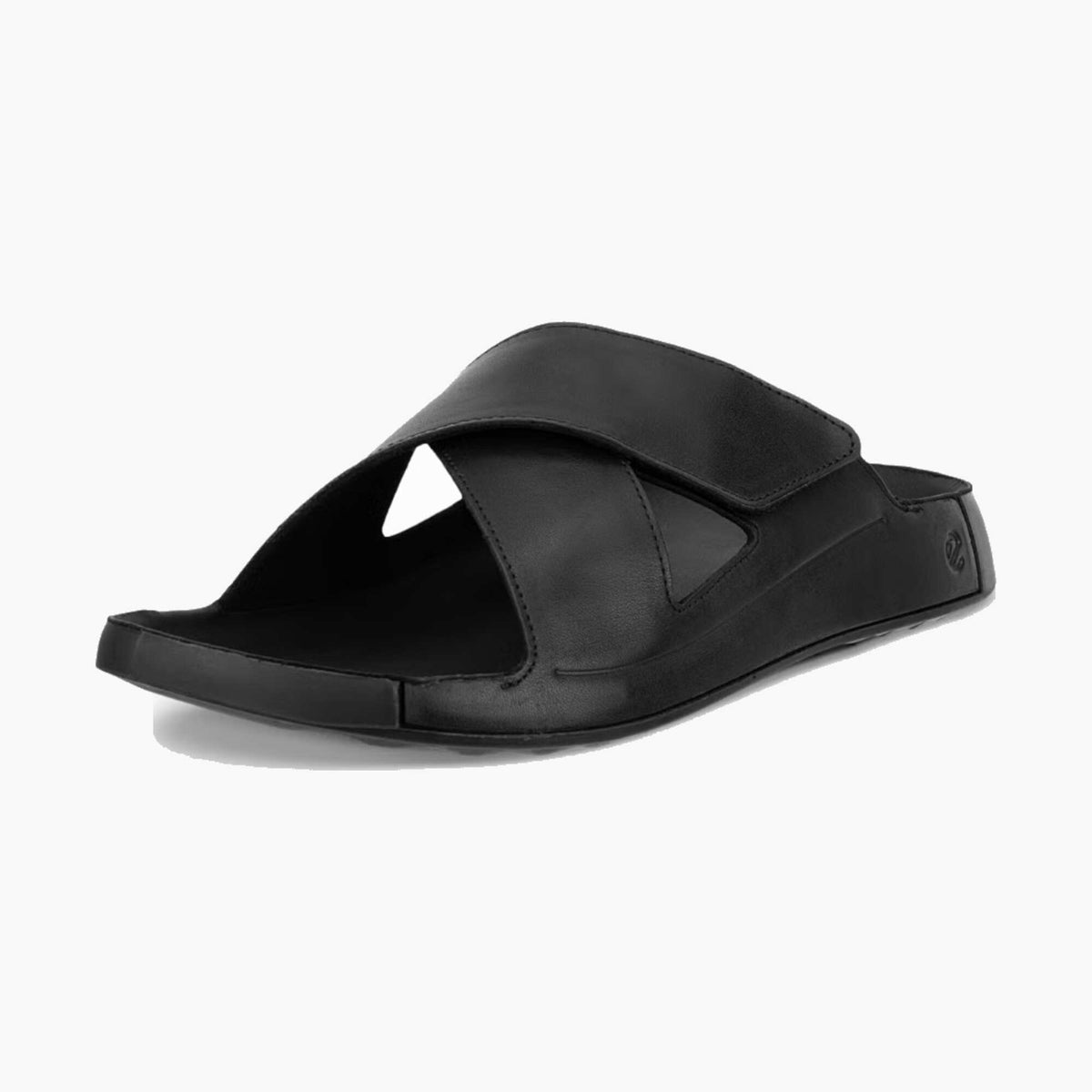 Black leather shoe with thick sole on a white background