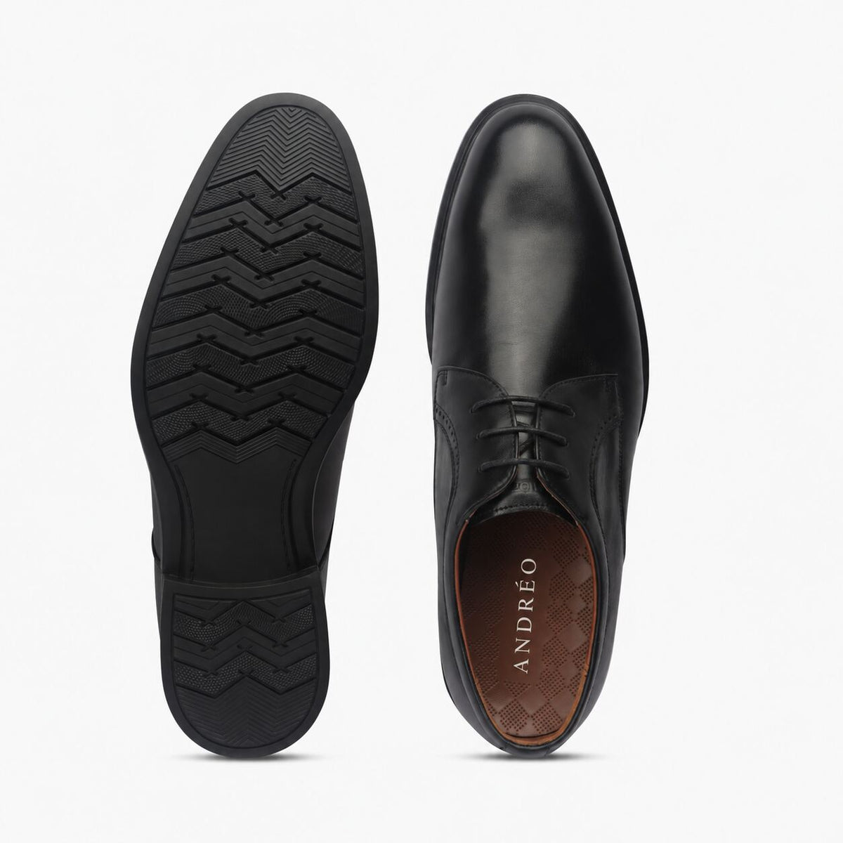 A pair of black leather dress shoes shown from the top and side views against a clean white background. The brand name 'ANDRƒO' is visible on the brown insole.